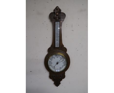 A Victorian oak aneroid barometer/thermometer Condition Report:Available upon request