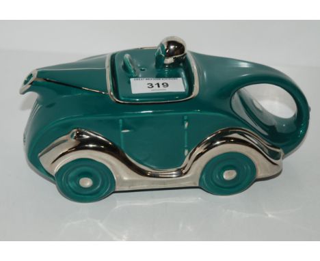 A Sadler OKT42 racing car teapot in teal green glaze Condition Report:Available upon request