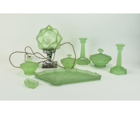 1930' Pressed Glass Dressing Table Set comprising three bowls and covers, two candle holders, a fan shaped tray and trinket. 