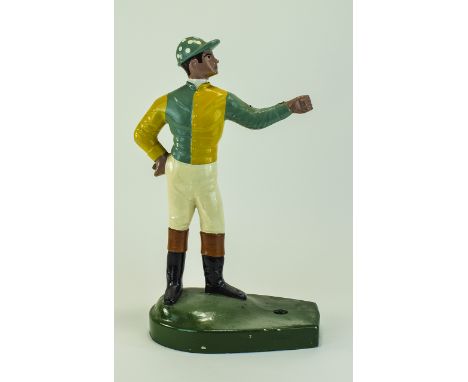 A Vintage - Hand Painted Resin Advertising Feature In The Form of a Jockey Dressed In a Green and Yellow Racing Outfit with B