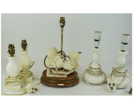 Collection of Four Onyx Table Lamps together with an Italian figural turtle doves table lamp on wooden base.