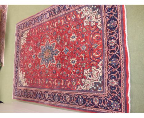 Good red ground Persian carpet