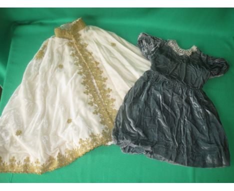 Assorted children's clothing to include vintage blue velvet dress with lace trim, a velvet cape with gilt embroidered trim, a