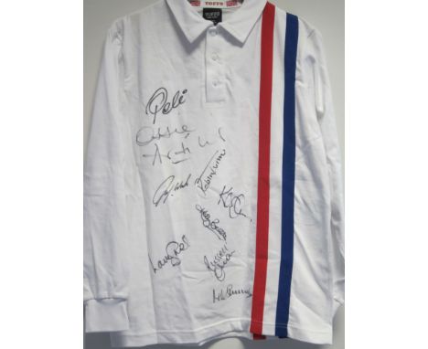 PELE / ARDILLES / ESCAPE TO VICTORY AUTOGRAPHS       A replica white with one blue and one red stripe long sleeve shirt from 
