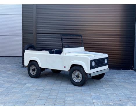 Glass fibre over a galvanised chassis driven by a 12-volt motor to the rear wheels with forward and reverse gears. Offered wi