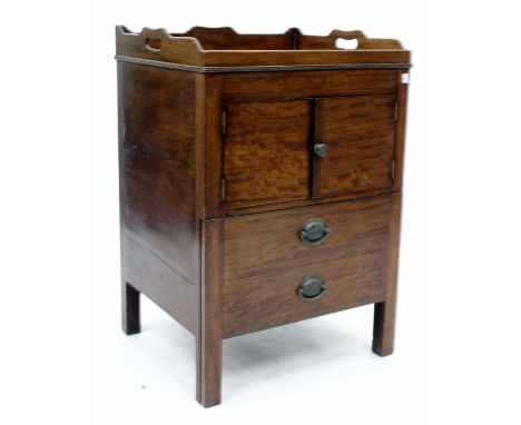 A 19TH CENTURY MAHOGANY TRAY TOPPED COMMODE with twin cupboard doors over  two faux drawer fronts 57cm wide x 83cm high  