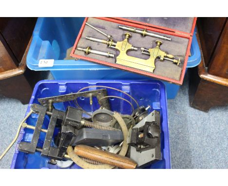 A SELECTION OF CLOCKMAKERS TOOLS and equipment including a depth gauge and a gacot, a vice, measuring instruments etc.