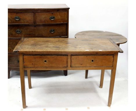 AN EARLY 20TH CENTURY PINE SCHOOL DESK fitted with two frieze drawers, 123cm x 77cm x 55cm; a 19th century walnut bow fronted