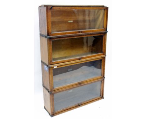 FOUR SECTIONS OF GLOBE WERNICKE BOOK CASE, each 86cm wide 