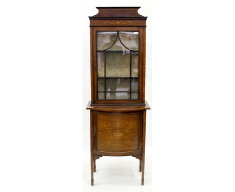 AN EDWARDIAN MAHOGANY DISPLAY CABINET the upper glazed section with satinwood cross banded decoration on a lower bow fronted 