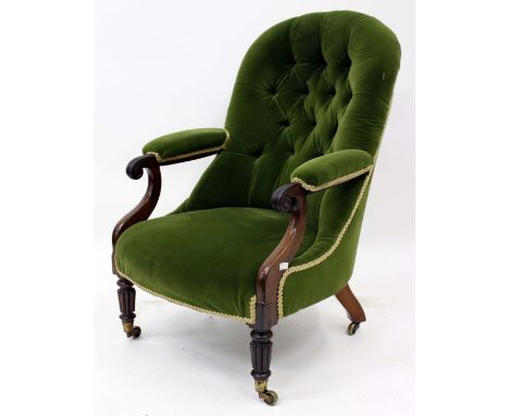 A 19TH CENTURY ROSEWOOD FRAMED GREEN DRAYLON BUTTON BACK UPHOLSTERED ARMCHAIR with reeded front legs and brass casters, 66cm 