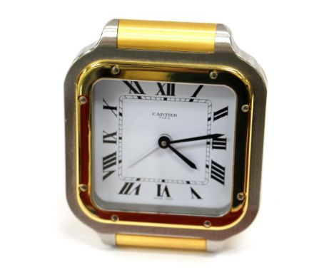 A CASED CARTIER PARIS QUARTZ BEDSIDE TIMEPIECE with silver and gold engine turned decoration, 9cm in height