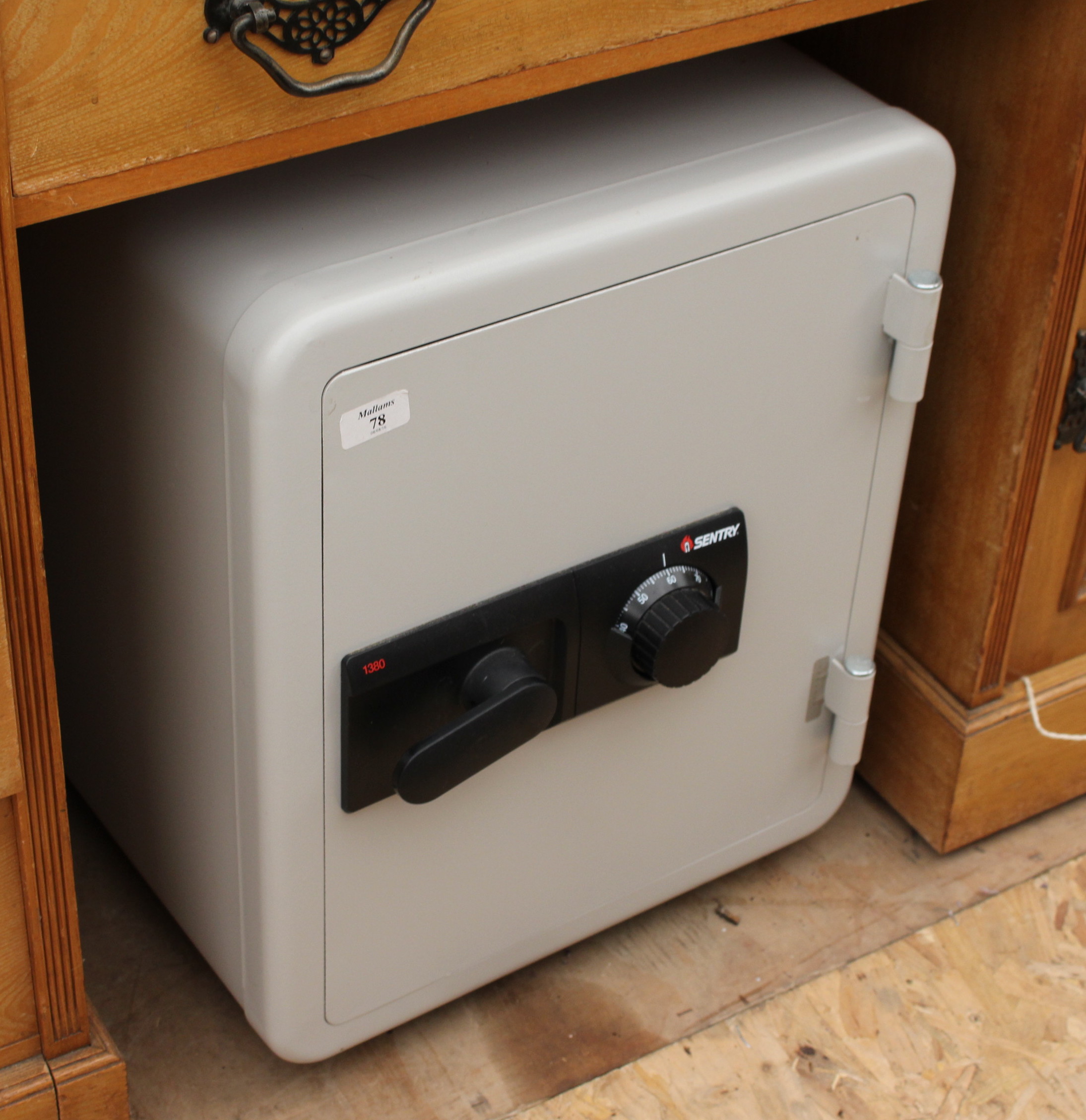 A MODERN COMBINATION SAFE by Sentry, 44cm wide x 54cm high x 58cm deep