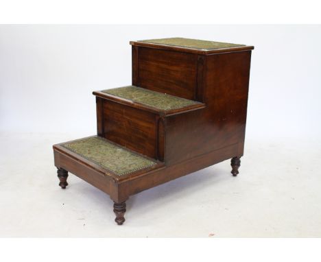 A 19TH CENTURY SET OF MAHOGANY BED OR LIBRARY STEPS with carpet inset steps, the top set with a lifting lid enclosing a commo