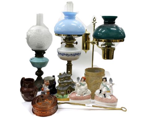 TWO VICTORIAN OIL LAMPS together with a further oil lamp, three Staffordshire flatback figures, a Victorian stoneware cylindr
