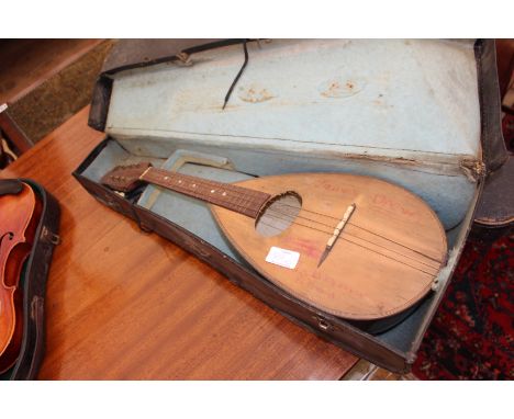 A VIOLIN, the two piece back measuring 35.5cm complete with bow and case together with a further violin with bow and case and