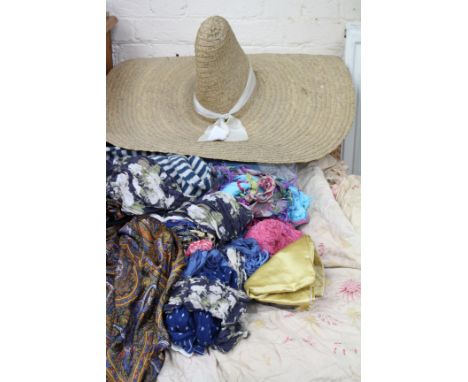 A COLLECTION OF VINTAGE MATERIAL ITEMS to include scarves, French fabric, silk dressing gown etc. and a 1920's large straw ha