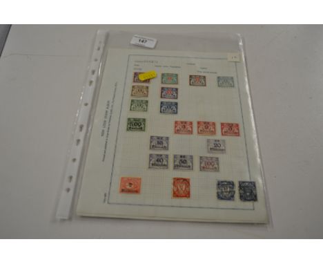 A packet containing small stamp collections of Dansig, Latvia and Lithuania