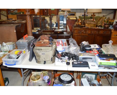 A large quantity of various empty camera cases; some digital cameras etc