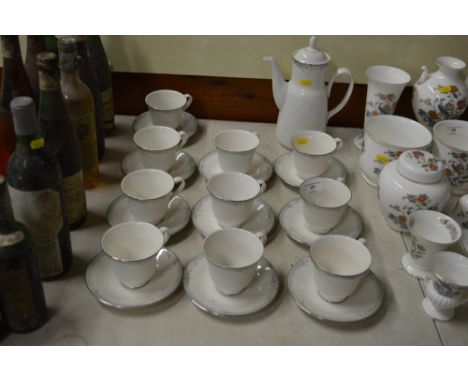 Ten Royal Doulton "Sophistication" tea cups and saucers, and a matching coffee pot 