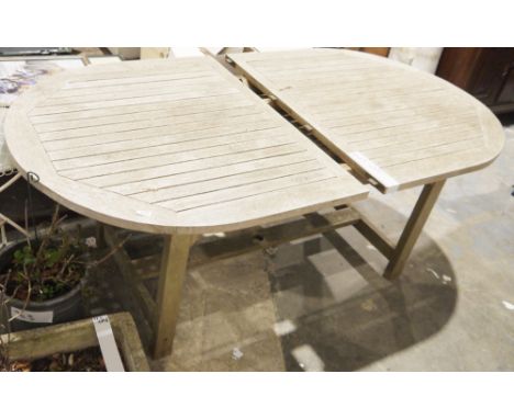 D-end teak extending garden table, 180cm long x 100cm wide x 77cm high (closed), a painted metal garden table, circular, on f