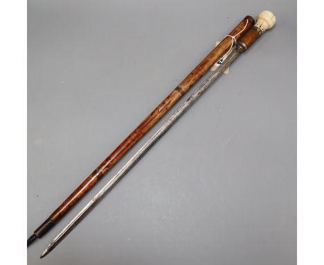 An 18th century French bone handled swordstick with engraved blade overall length 80cm