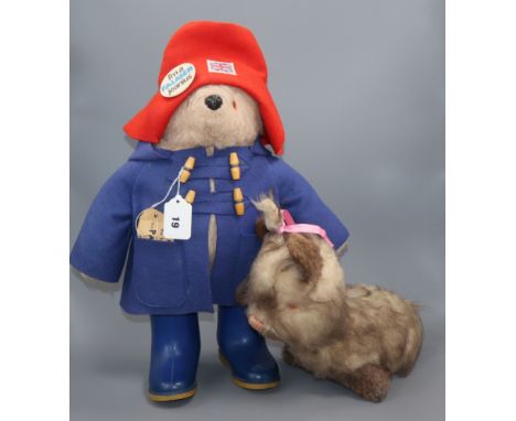 A Paddington Bear, with original clothes, Dunlop boots / label, very good condition and a Yorkshire Terrier