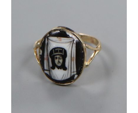 A Russian? yellow metal and two colour enamel oval portrait ring, size G.