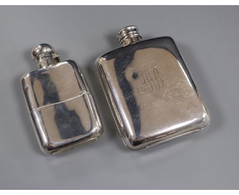 A late Victorian silver hip flask, Sheffield, 1900 and a plated hip flask.