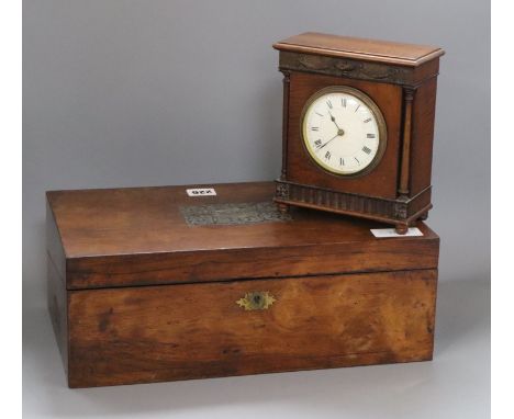 A writing slope and a French mahogany mantel clock