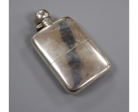 A George V silver hip flask, George Unite &amp; Sons, Birmingham, 1917, 13.9cm.