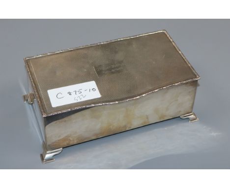 A George VI silver engine turned presentation cigarette box, Birmingham, 1947, 17.cm.