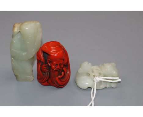 A Chinese carved jade group of two kylin, red lacquered and carved figure of a sage tallest 7cm