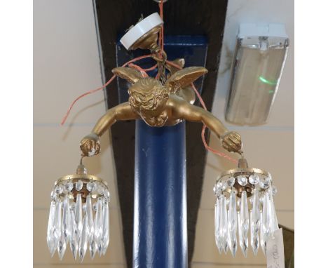 A plaster cherub light fittings with lustre drops