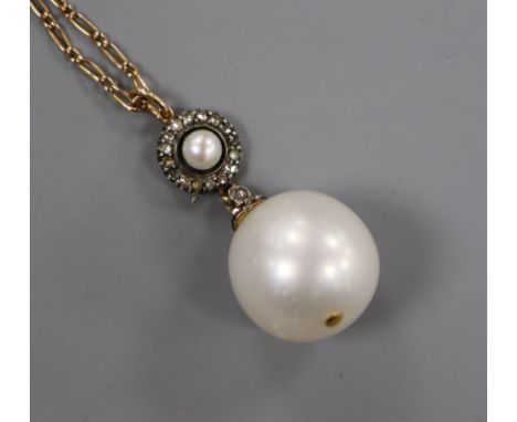 A yellow metal, rose cut diamond and cultured pearl set drop pendant, on a yellow metal chain, pendant approx. 28mm.