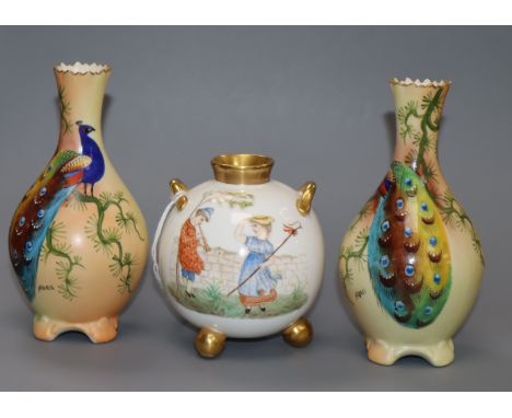 A pair of Royal Worcester blush vases and a figurative vase