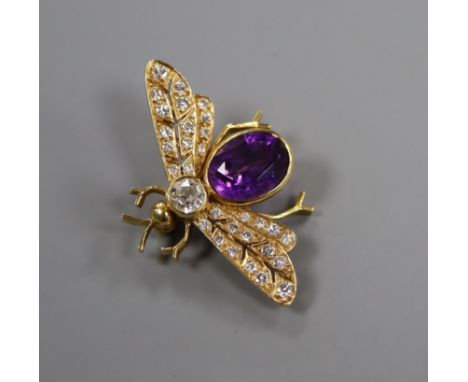 A yellow metal, amethyst and diamond set bug brooch, diameter 35mm.