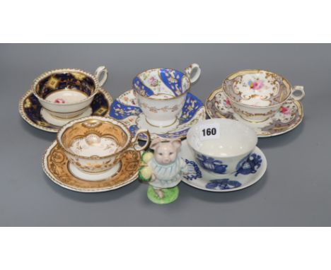 Four cabinet cups and saucers, a Japanese cup and saucer and a Beatrix Potter Little Pig Robinson