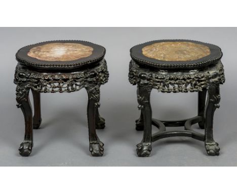 Two late 19th/early 20th century Chinese hardwood stands
Each of beaded lobed form centred with a marble inset panel above th