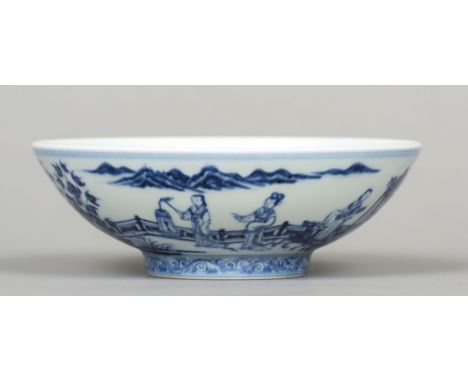 A Chinese blue and white porcelain bowl
Decorated with a female dignitary in a horse drawn sedan chair with female attendants