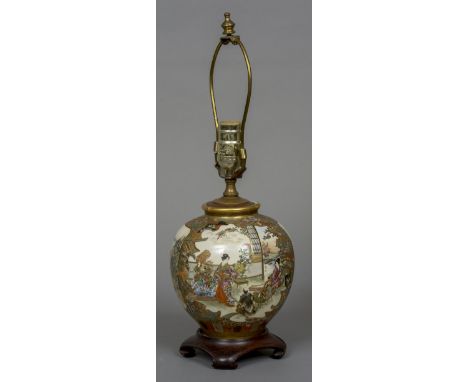 A late 19th century Japanese satsuma vase
Of squat ovoid form, decorated in the round with various dignitaries, attendants an