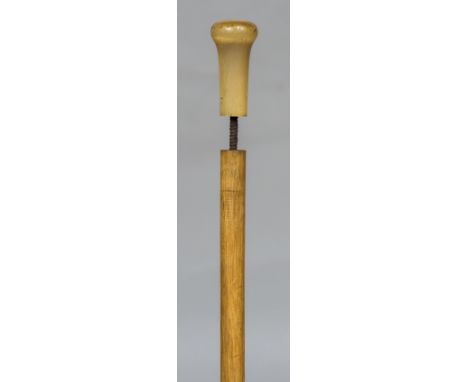 A Victorian walking stick
The knop handle possibly rhino horn, mounted on a plain shaft.  87 cm long.  CONDITION REPORTS: Som