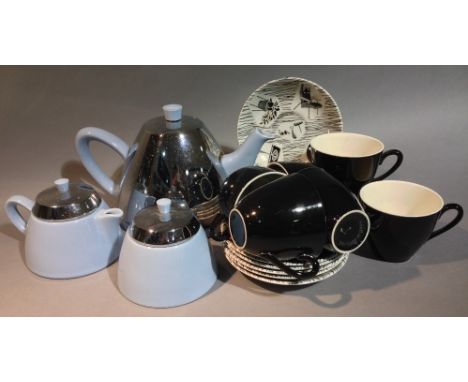 A set of six 1950s Home Maker pattern tea cups and saucers
Together with a Heatmaster teapot, milk jug and sugar basin.