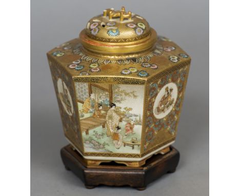 A Japanese Meiji period Kinkozan Awata Kyo-Yaki or Satsuma vase and cover
Of hexagonal form and typically profusely decorated