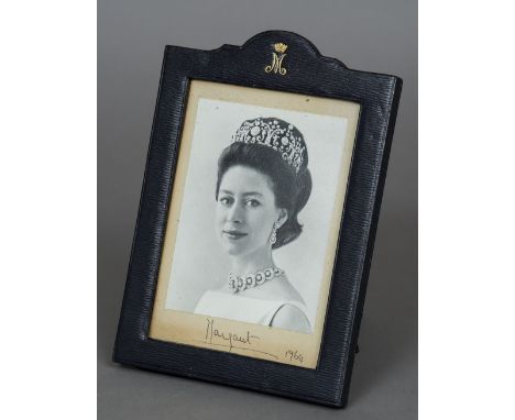 Princess Margaret, Countess of Snowdon, portrait photograph in monogrammed leather frame by H.H. Plante, London
Signed to mar