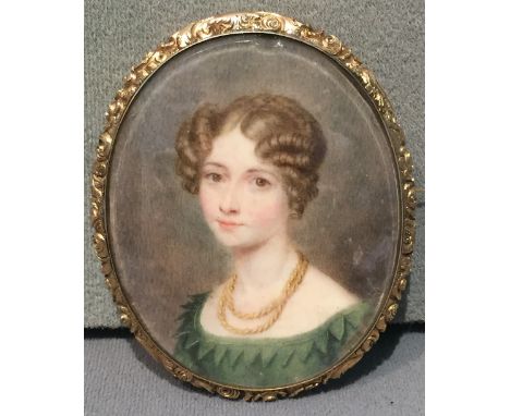 ENGLISH SCHOOL (19th century)
Portrait Miniature of a Young Lady
Watercolour on ivory, opposing a hair work panel
5.5 x 7 cm 