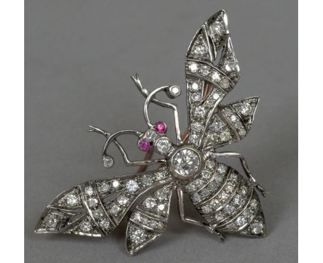 A 9 ct gold and silver diamond and ruby set bee brooch pendant
Naturalistically modelled. 5 cm wide. CONDITION REPORTS: Gener