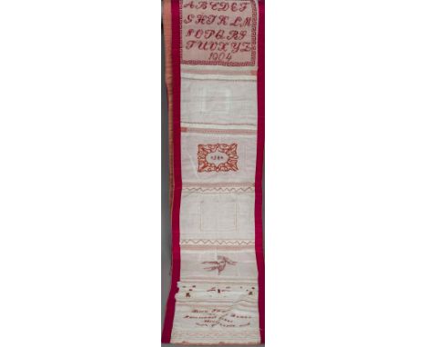 An early 20th century French Ursuline Convent embroidered strip sampler
Worked with alphabets and lace work bands, signed Dai