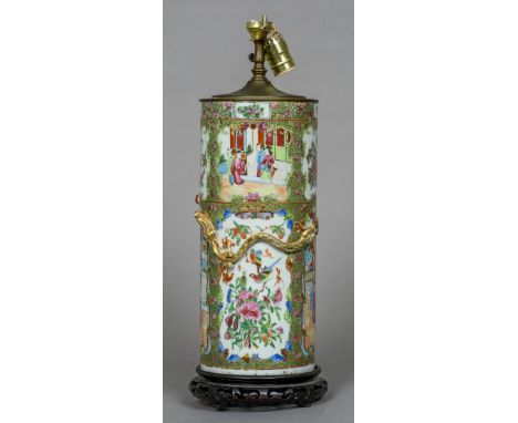 A 19th century Cantonese porcelain table lamp
Of cylindrical form, decorated in relief with dragons chasing a flaming pearl a