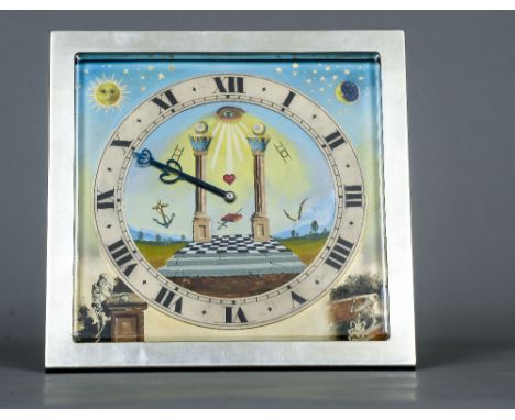 A Continental gilt and white metal framed Masonic decorated desk timepiece
The silvered dial with Roman numerals and decorate